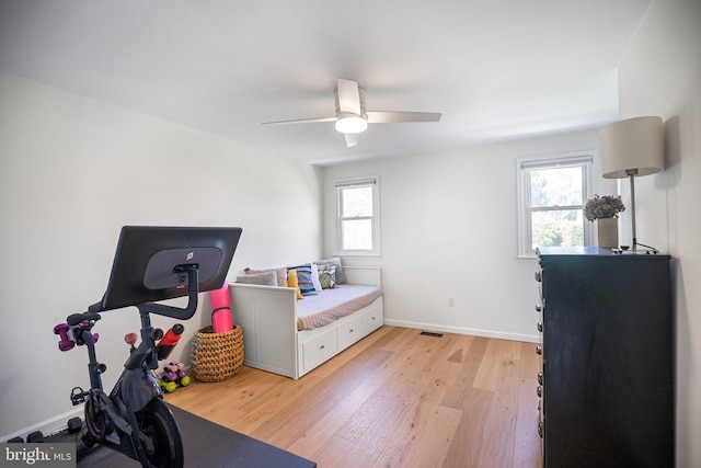36 Gettysburg Ln, Newtown, PA 18940 - workout room featuring light wood finished floors, a ceiling fan, and baseboards