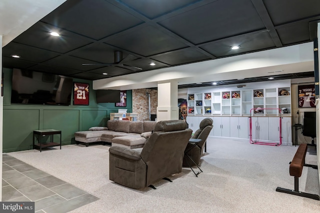 cinema with carpet floors and recessed lighting