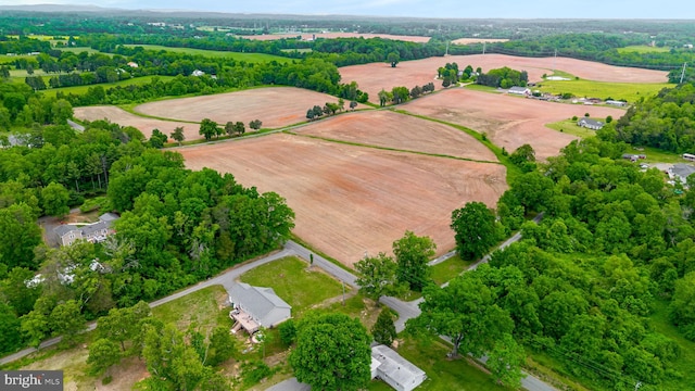 aerial view of property and surrounding area featuring property boundaries highlighted