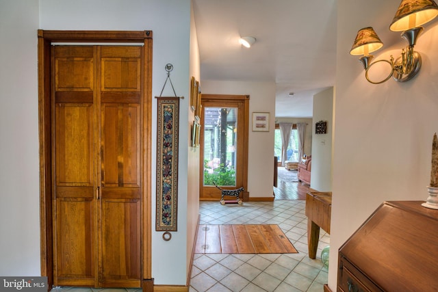 3012 Duncan Rd, White Hall, MD 21161 - entrance foyer with light tile patterned flooring and baseboards