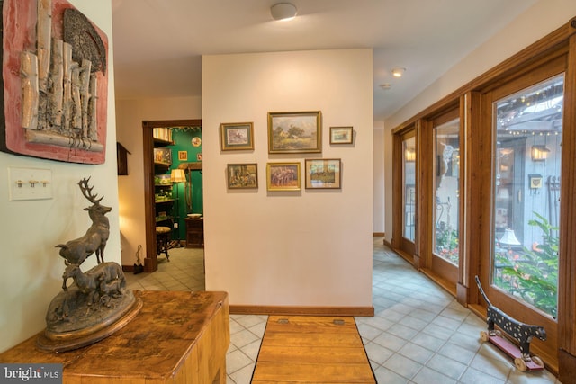 3012 Duncan Rd, White Hall, MD 21161 - hallway featuring light tile patterned floors and baseboards