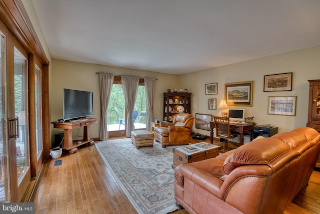 3012 Duncan Rd, White Hall, MD 21161 - living room featuring hardwood / wood-style floors and an office area