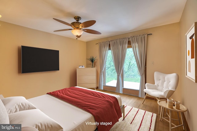 3012 Duncan Rd, White Hall, MD 21161 - bedroom with hardwood / wood-style floors, ceiling fan, and access to outside