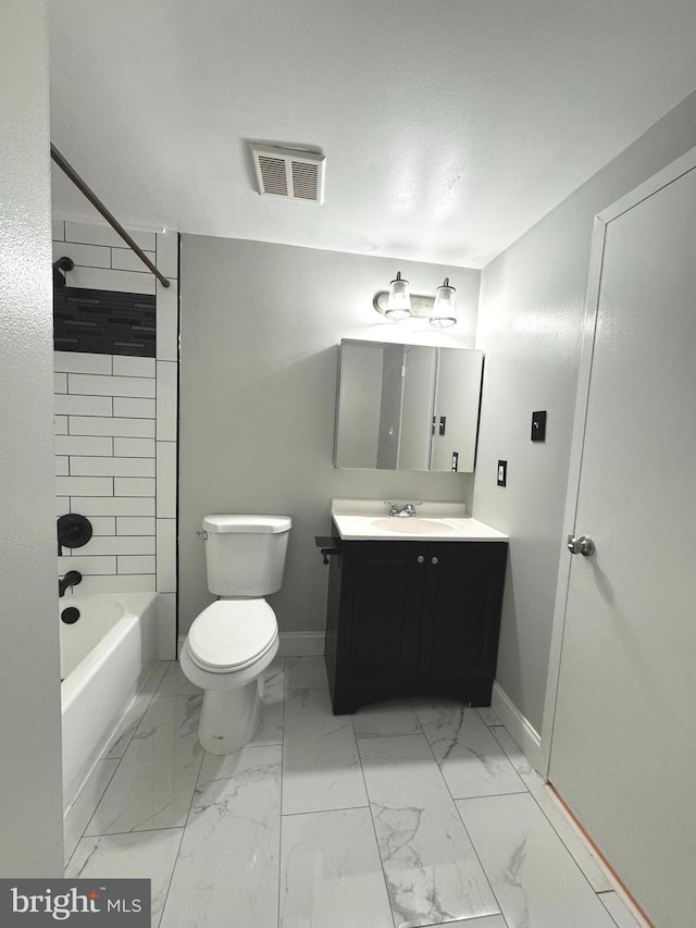 full bath featuring baseboards, vanity, toilet, and washtub / shower combination