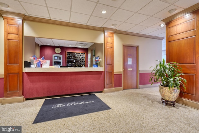 reception with ornamental molding and recessed lighting