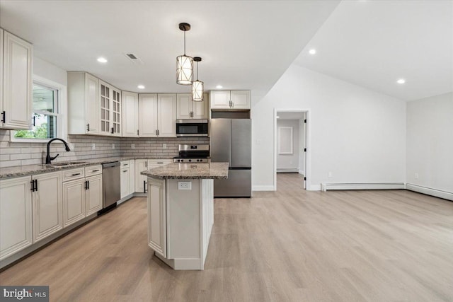 119 Oaktree Dr, Levittown, PA 19055 - kitchen featuring a sink, stainless steel appliances, backsplash, a center island, and recessed lighting