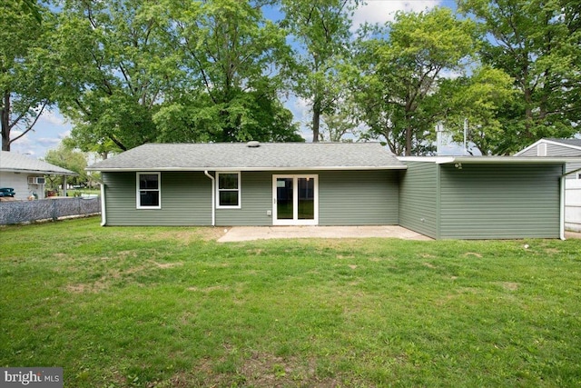 119 Oaktree Dr, Levittown, PA 19055 - rear view of property with a patio area