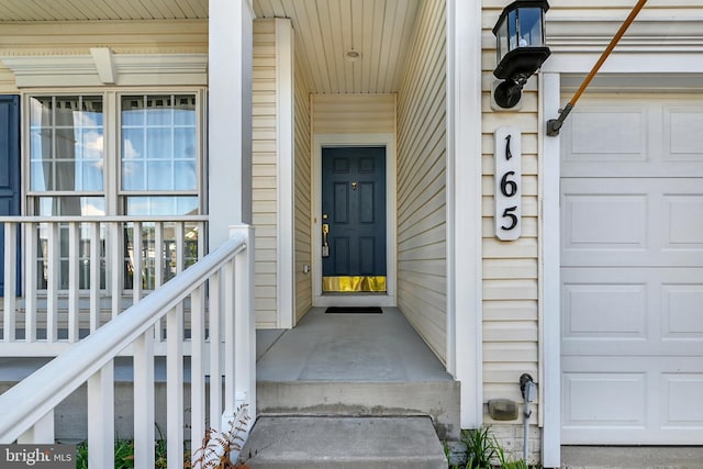property entrance with covered porch