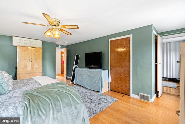 717 E Greenman Rd, Haddonfield, NJ 08033 - bedroom with wood finished floors, a ceiling fan, and baseboards