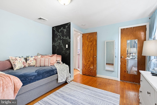 717 E Greenman Rd, Haddonfield, NJ 08033 - bedroom featuring light wood finished floors and baseboards