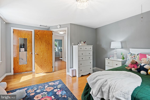 717 E Greenman Rd, Haddonfield, NJ 08033 - bedroom featuring wood finished floors and baseboards