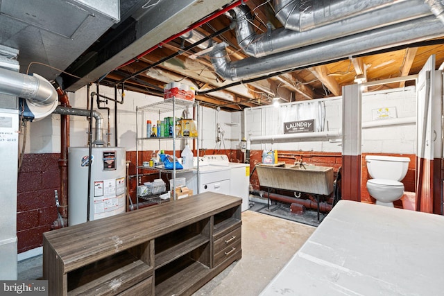 717 E Greenman Rd, Haddonfield, NJ 08033 - unfinished basement featuring gas water heater, a sink, and washing machine and dryer