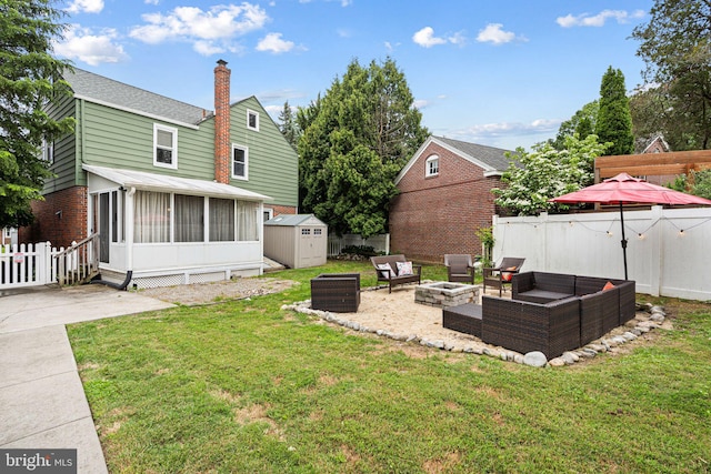 717 E Greenman Rd, Haddonfield, NJ 08033 - view of yard featuring an outdoor living space with a fire pit, a sunroom, and a patio area
