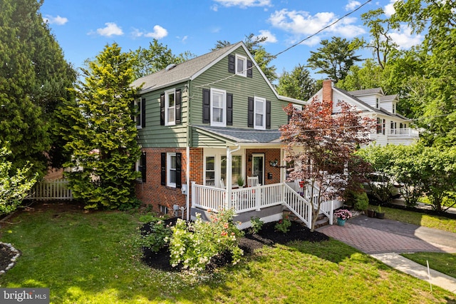 717 E Greenman Rd, Haddonfield, NJ 08033 - view of front of home with brick siding and a shingled roof