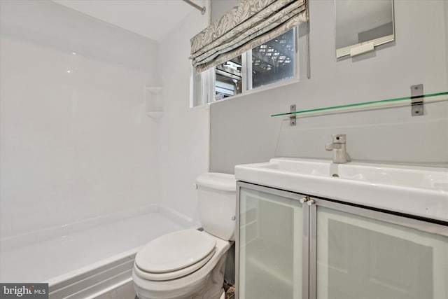 1407 Clarkson St, Baltimore, MD 21230 - bathroom featuring toilet, vanity, and a shower