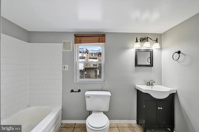 1407 Clarkson St, Baltimore, MD 21230 - full bathroom featuring vanity, baseboards, tile patterned flooring, toilet, and bathtub / shower combination