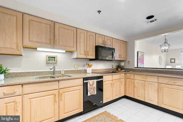 930 Astern Way Unit 502, Annapolis, MD 21401 - kitchen featuring black appliances, light brown cabinets, a sink, and light tile patterned floors