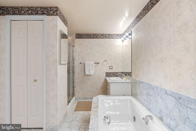930 Astern Way Unit 502, Annapolis, MD 21401 - bathroom with a closet, wallpapered walls, a tub with jets, a shower stall, and vanity