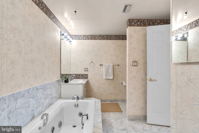 930 Astern Way Unit 502, Annapolis, MD 21401 - full bath with a whirlpool tub, vanity, and wallpapered walls