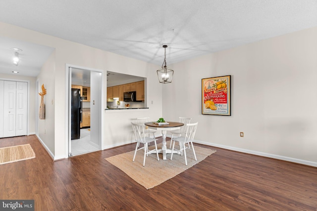 930 Astern Way Unit 502, Annapolis, MD 21401 - dining area featuring dark wood finished floors and baseboards