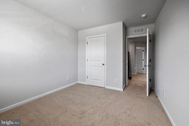 1638 Terrapin Cir, Cambridge, MD 21613 - unfurnished bedroom featuring carpet floors and baseboards