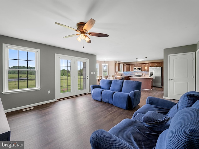 1497 Double Church Rd, Stephens City, VA 22655 - living area featuring a ceiling fan, baseboards, and dark wood-style floors