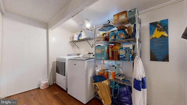 504 SE Front St, Milford, DE 19963 - washroom featuring washing machine and dryer and wood finished floors
