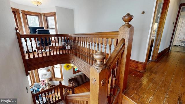 504 SE Front St, Milford, DE 19963 - staircase with hardwood / wood-style floors and baseboards