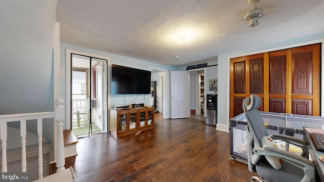 504 SE Front St, Milford, DE 19963 - home office featuring a textured ceiling and dark wood-style floors