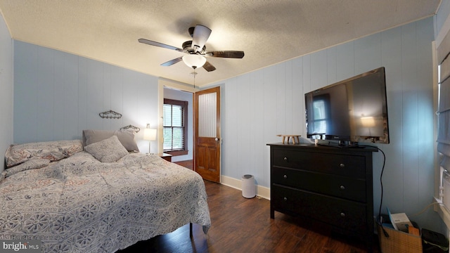 504 SE Front St, Milford, DE 19963 - bedroom featuring wood finished floors, ceiling fan, baseboards, and a textured ceiling