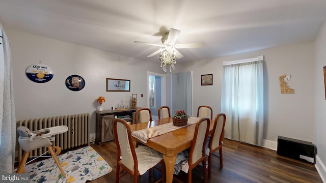 504 SE Front St, Milford, DE 19963 - dining area featuring radiator, wood finished floors, ceiling fan, and baseboards