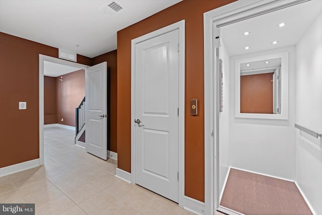 42869 Littlehales Ter, Ashburn, VA 20148 - hall with baseboards, recessed lighting, elevator, and light tile patterned flooring