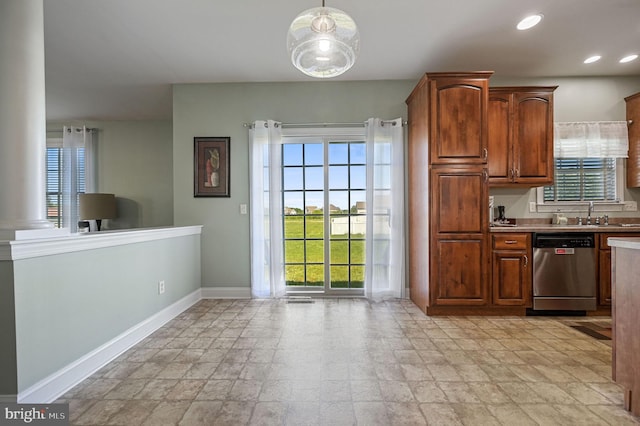 99 Topaz Ln, Camden Wyoming, DE 19934 - kitchen featuring dishwasher, baseboards, light stone finish flooring, light countertops, and recessed lighting