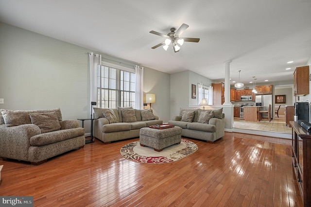 99 Topaz Ln, Camden Wyoming, DE 19934 - living room featuring light wood finished floors, ceiling fan, healthy amount of natural light, and recessed lighting