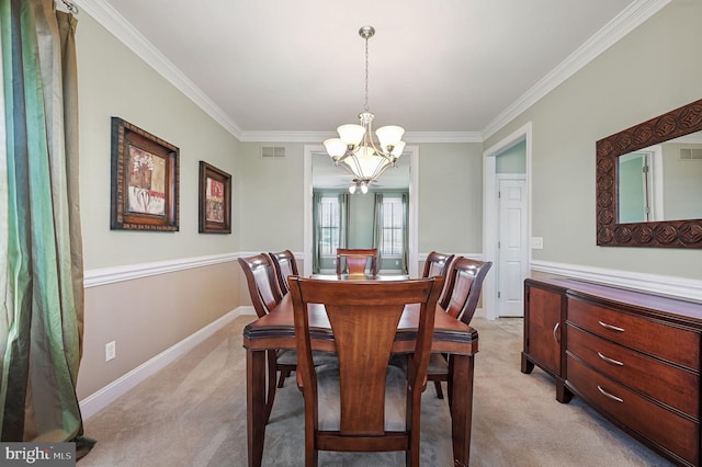 99 Topaz Ln, Camden Wyoming, DE 19934 - dining room with a chandelier, ornamental molding, light carpet, and baseboards