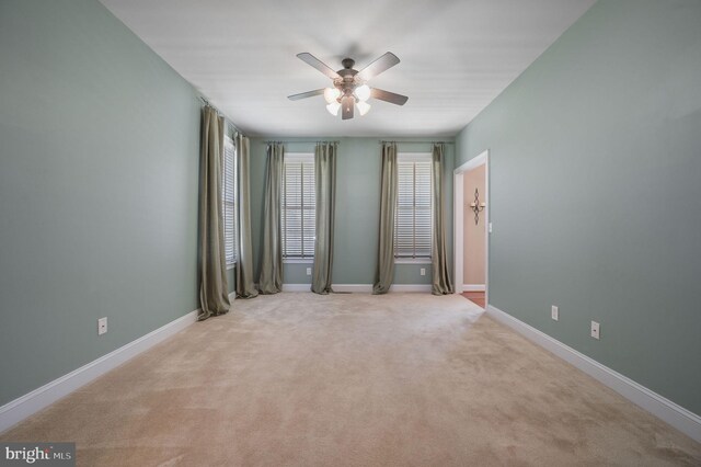 99 Topaz Ln, Camden Wyoming, DE 19934 - unfurnished bedroom with light colored carpet, baseboards, and a ceiling fan
