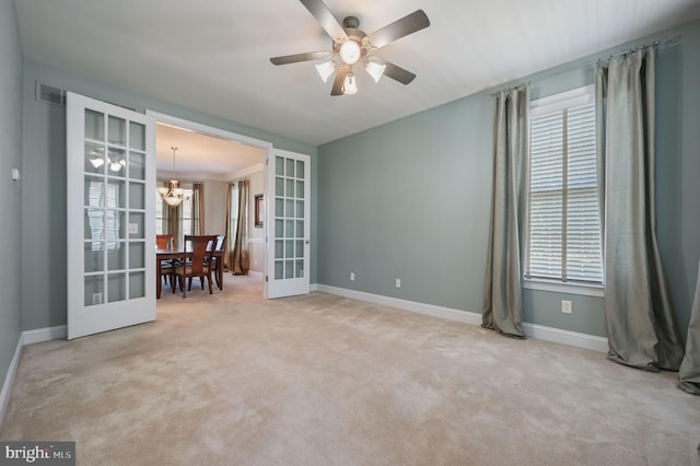99 Topaz Ln, Camden Wyoming, DE 19934 - carpeted empty room with plenty of natural light, baseboards, and french doors