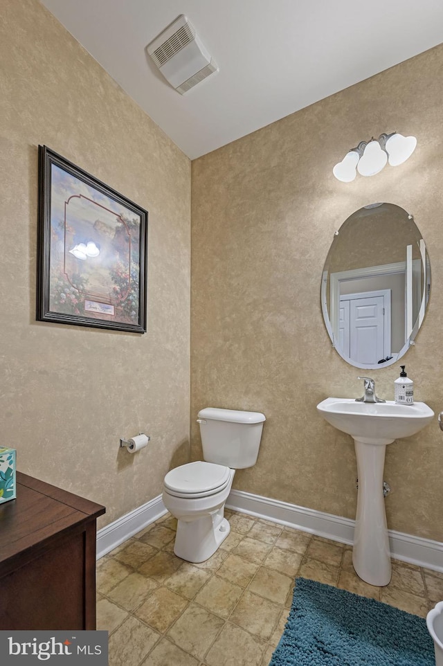 99 Topaz Ln, Camden Wyoming, DE 19934 - half bathroom with toilet and baseboards