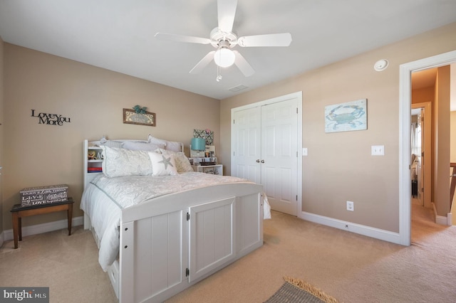 99 Topaz Ln, Camden Wyoming, DE 19934 - bedroom with light carpet, baseboards, a closet, and a ceiling fan