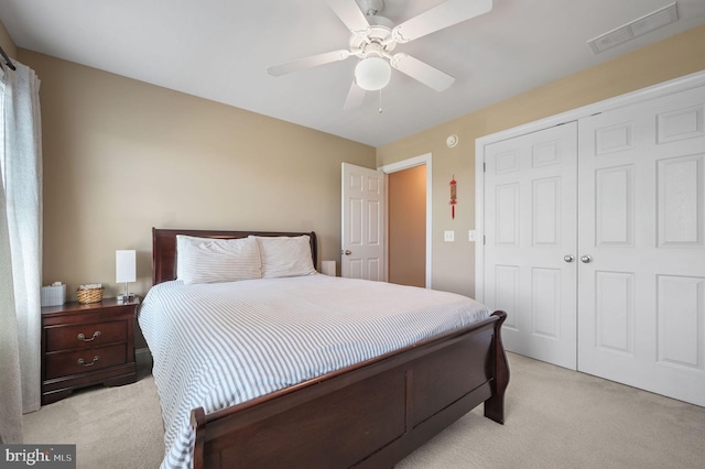 99 Topaz Ln, Camden Wyoming, DE 19934 - bedroom featuring light colored carpet, a closet, and a ceiling fan