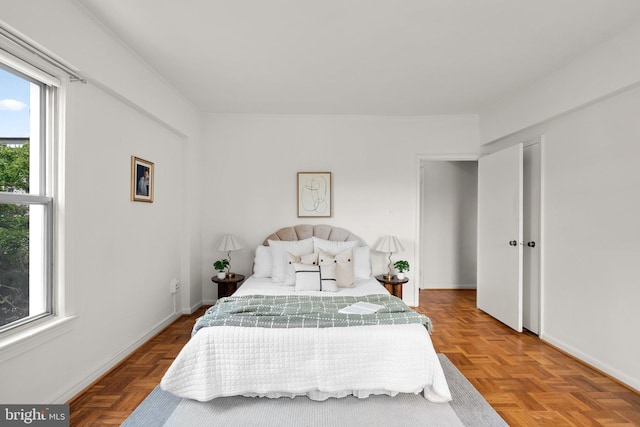 bedroom featuring baseboards