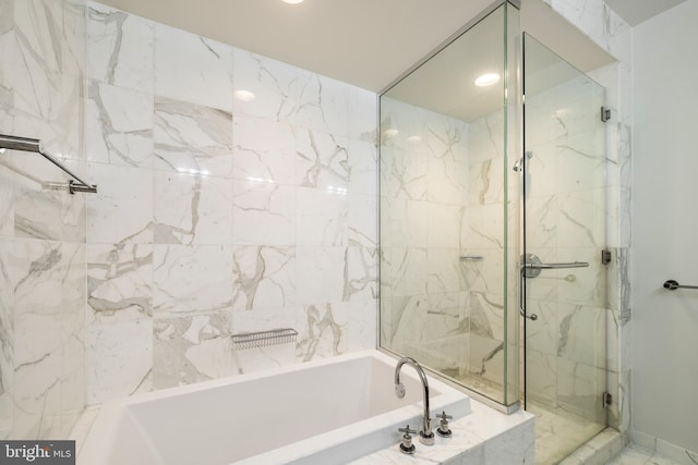 1414 S Penn Sq Unit 9A, Philadelphia, PA 19102 - full bath featuring a marble finish shower, a garden tub, and recessed lighting