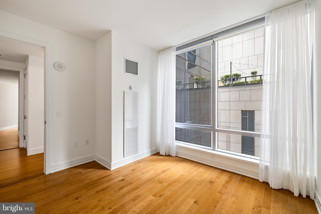 1414 S Penn Sq Unit 9A, Philadelphia, PA 19102 - unfurnished room featuring light wood finished floors and baseboards
