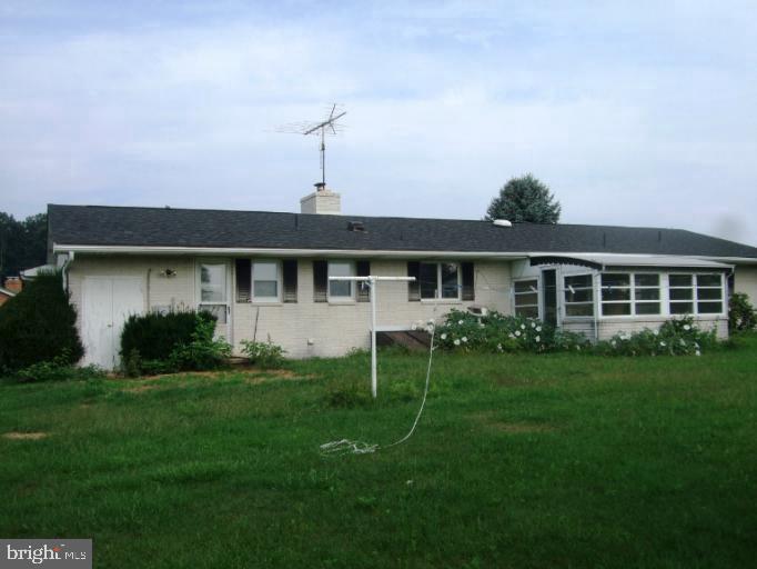 1803 Motter Rd, Westminster, MD 21158 - ranch-style house with a chimney and a front lawn