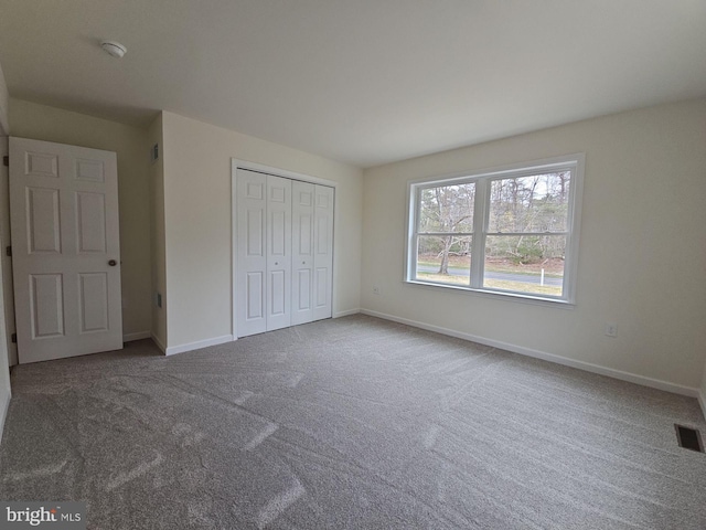 213 Newport Rd, Millville, NJ 08332 - unfurnished bedroom with carpet floors, baseboards, and a closet
