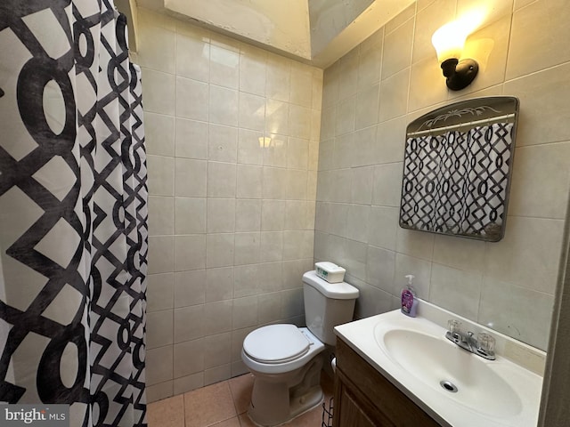 full bathroom with tile walls, vanity, toilet, tile patterned flooring, and a shower with curtain