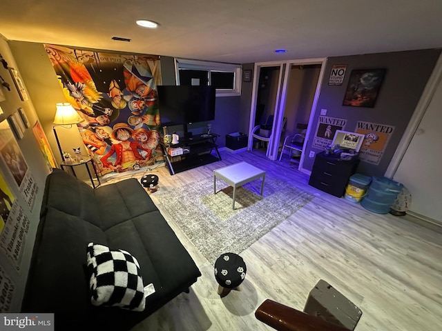 living area with wood finished floors