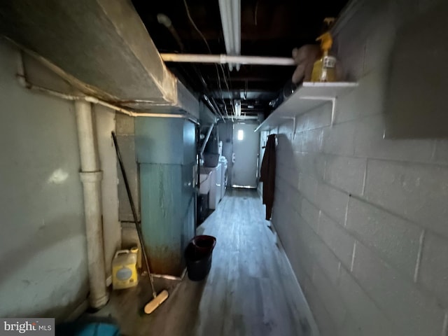 unfinished below grade area with independent washer and dryer