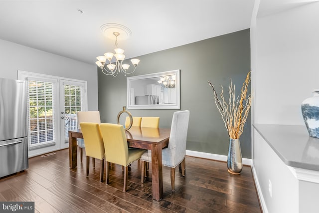 7820 Loblolly Way, Hanover, MD 21076 - dining room with dark wood finished floors, a chandelier, french doors, and baseboards