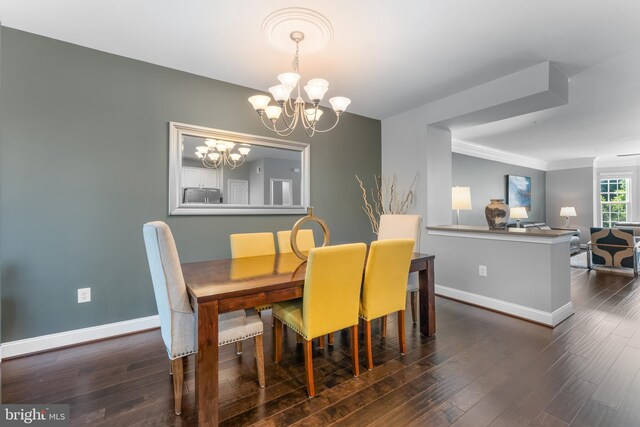 7820 Loblolly Way, Hanover, MD 21076 - dining room featuring a chandelier, baseboards, wood finished floors, and ornamental molding